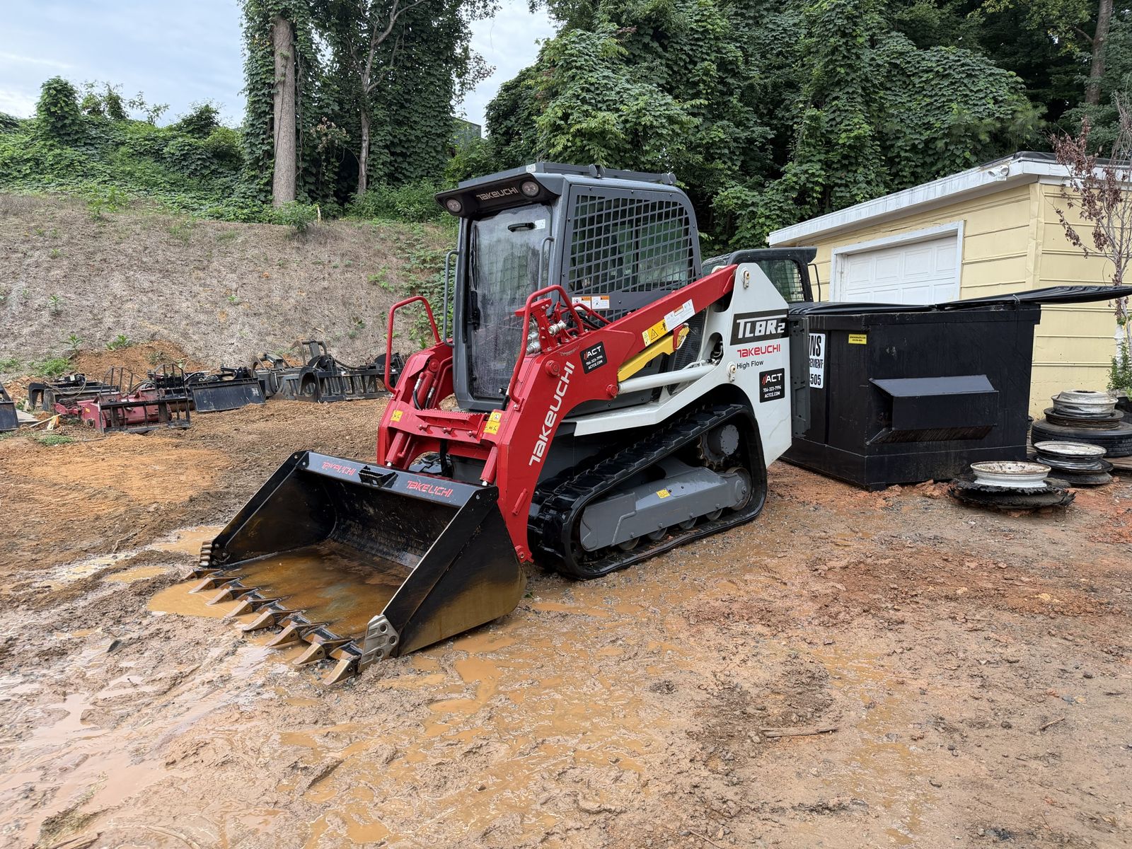 A track loader after cleaning on a job site